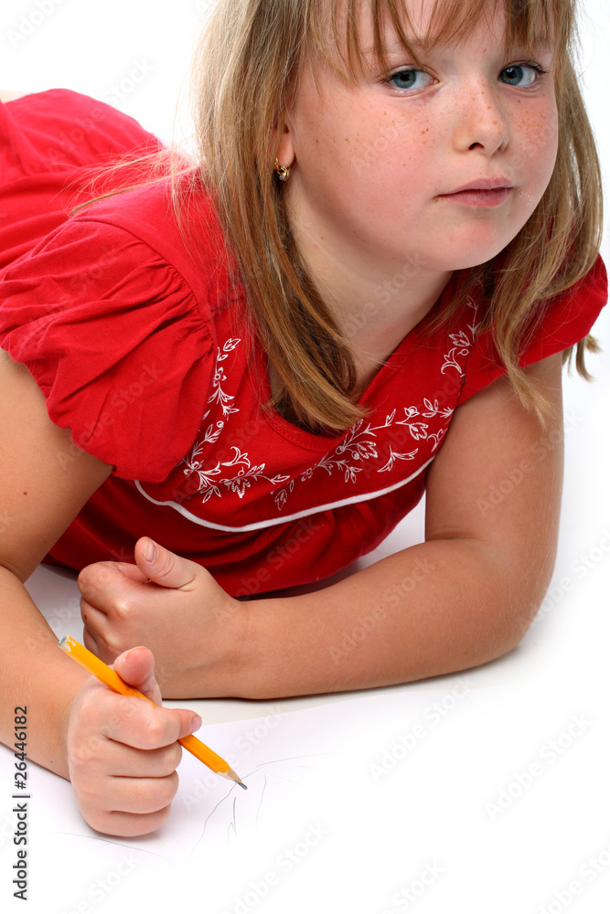 Small girl drawing something with a pencil isolated on white Small girl drawing something with a pencil isolated on white