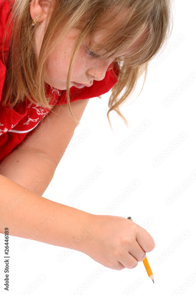 Small girl drawing something with a pencil isolated on white Small girl drawing something with a pencil isolated on white