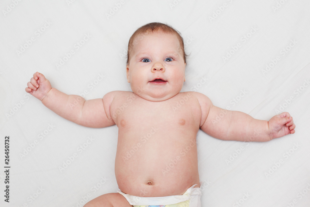 Happy 3 months old baby smiling, lying on white bed Stock Photo Adobe