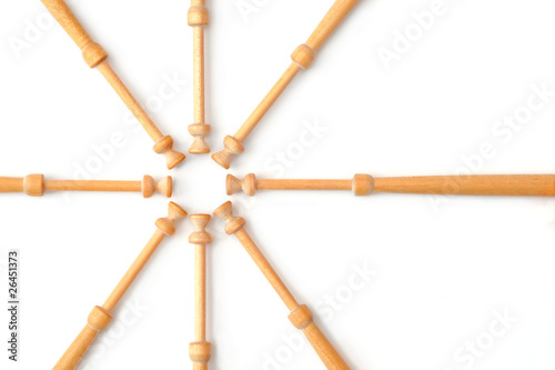 Foto lace making bobbin spindles on white