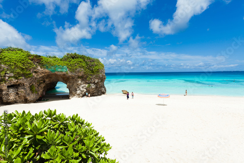 White sand tropical beach with clear blue sea, Okinawa, Japan photo