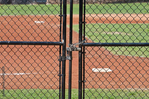 Padlock on Gate into Baseball Field