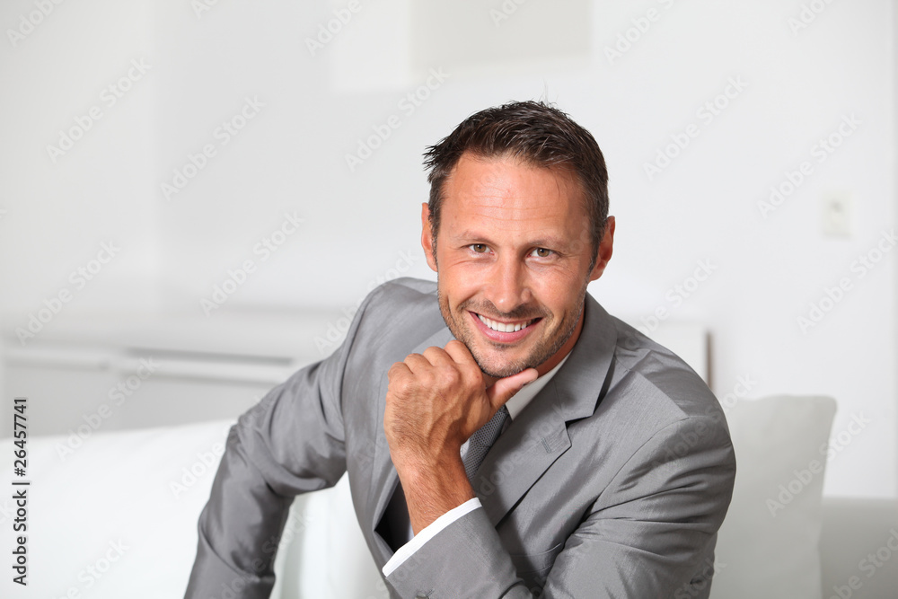 Closeup of businessman wearing grey suit Closeup of businessman wearing grey suit