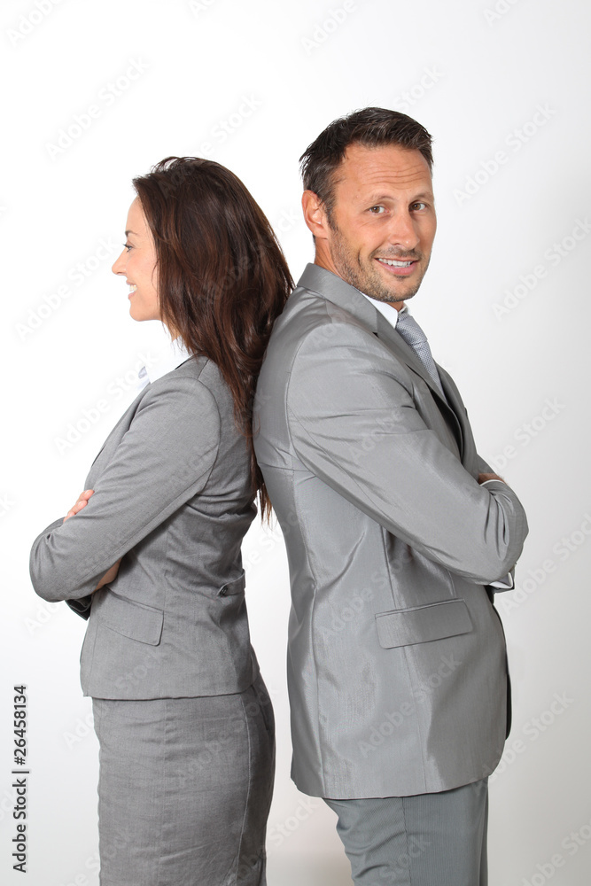 Business partners standing on white background Business partners standing on white background