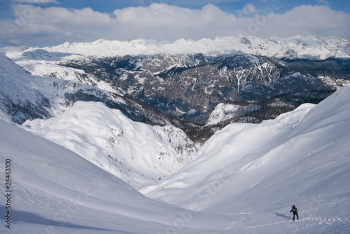 hiker in white mountains, julijan alps