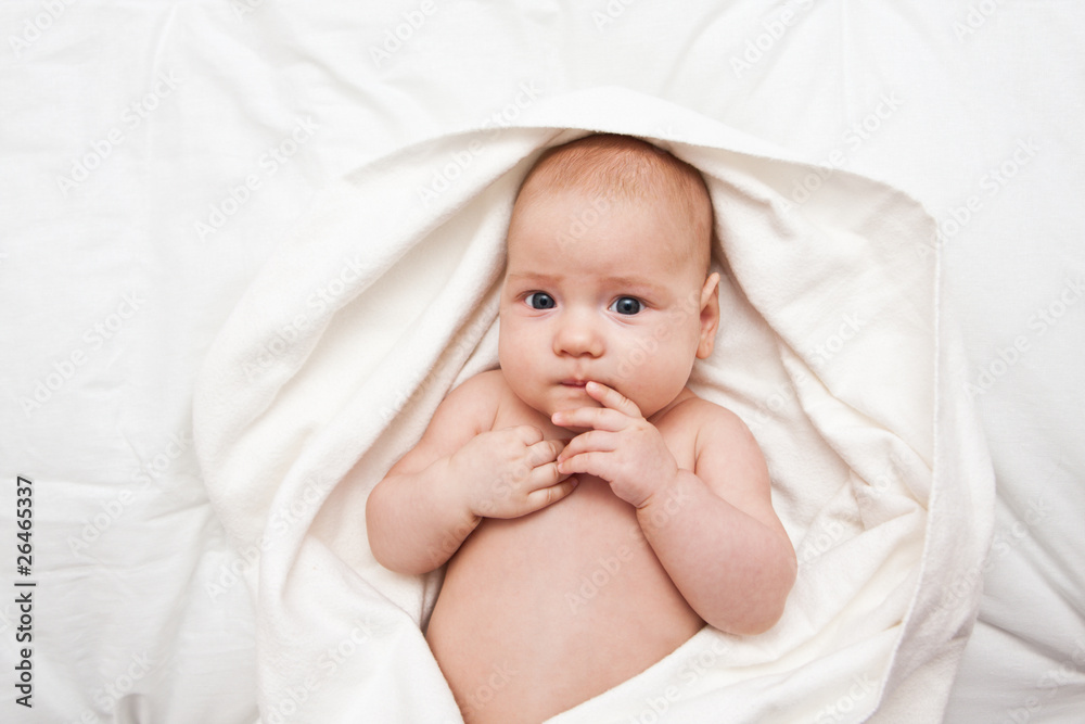 Thoughtfl little girl wrapped in blanket Thoughtfl little girl wrapped in blanket