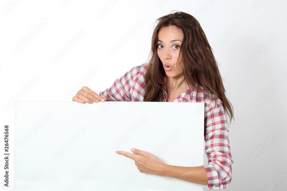 Woman showing white board on white background Woman showing white board on white background