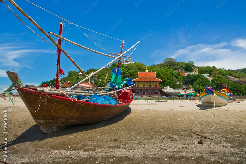 Fishing boats at cha-am beach in Thailand Fishing boats at cha-am beach in Thailand