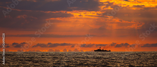 Navy ship on sunset