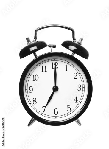 Alarm clock shows seven o`clock