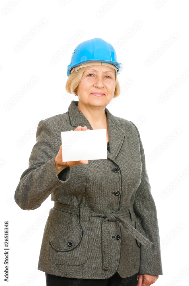 Senior woman with blue hard hat holding blank sigh