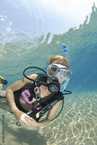 Adult Female scuba diver in bikini