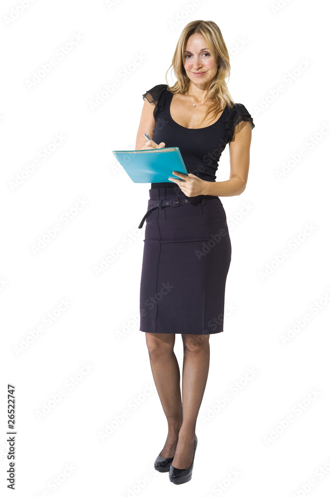 Young woman in business attire holding a planner Young woman in business attire holding a planner