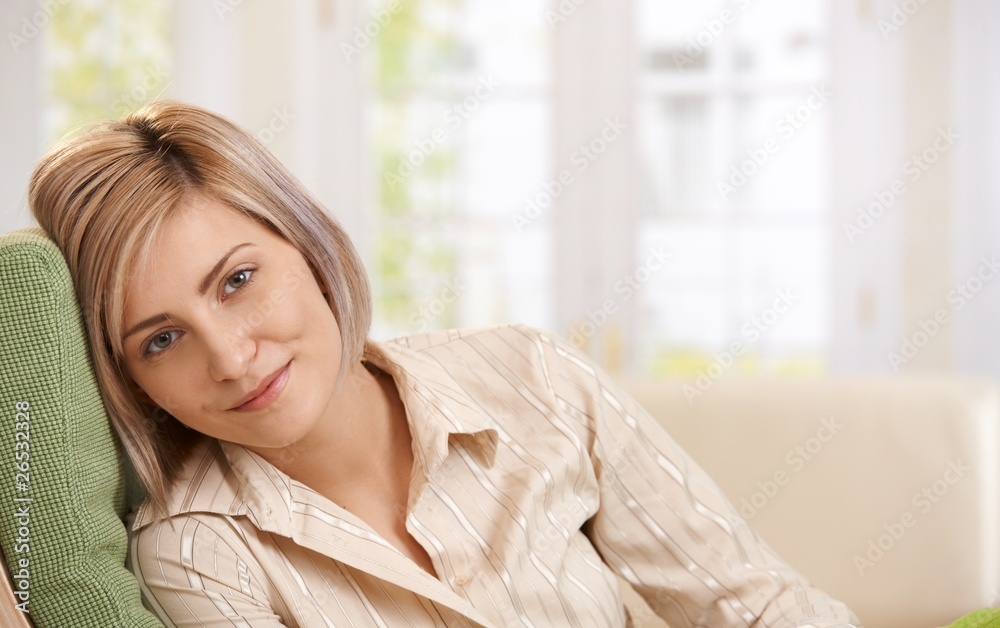 Portrait of happy woman at home