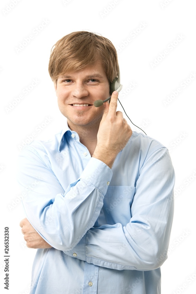 Young man talking on headset