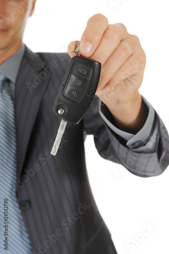 Businessman gives the keys to the car