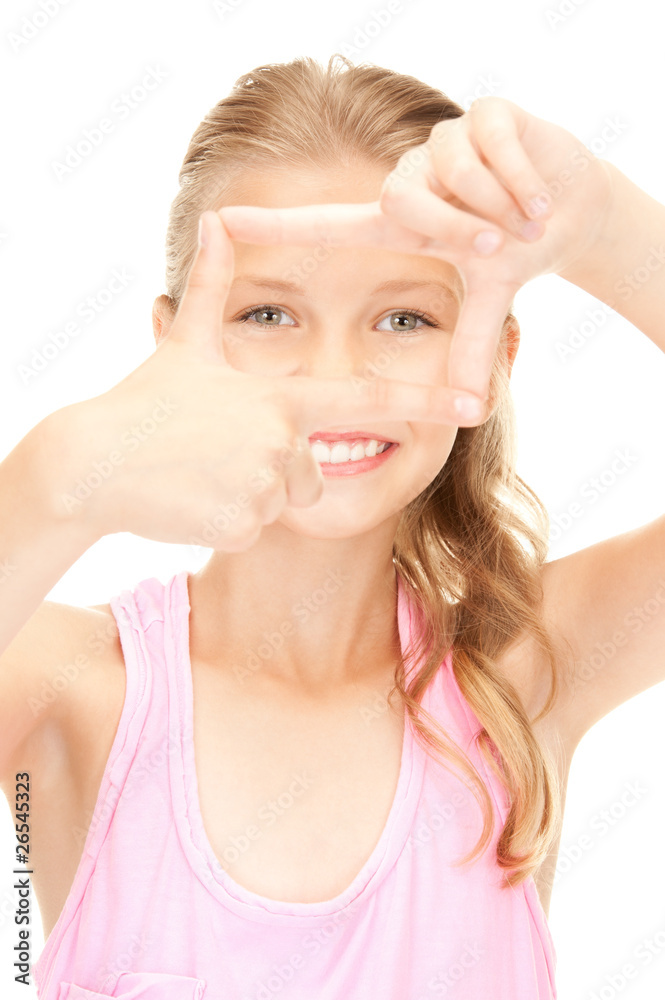 pretty girl creating a frame with fingers pretty girl creating a frame with fingers