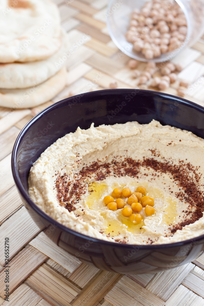 Hummus served with pita bread Hummus served with pita bread