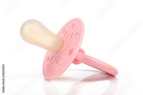 Pink baby silicone pacifier isolated on white
