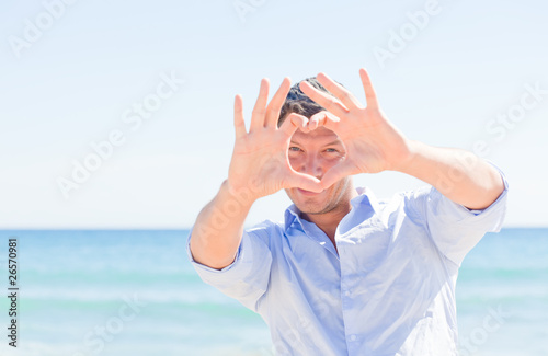man making heart sign