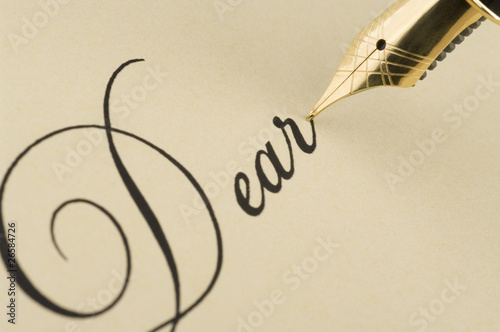 Inscription Dear with gold pen
