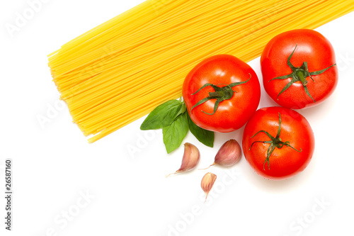 Pasta with fresh tomato, basil and garlic isolated on white back