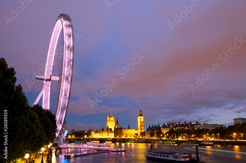 Evening view of London Eye and House of Parliament. UK