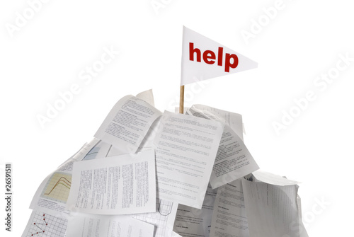 heap of papers with help flag sticking out