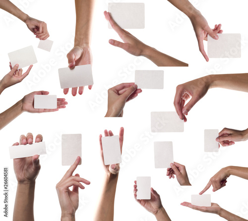 Collection of card blanks in a hand on white background