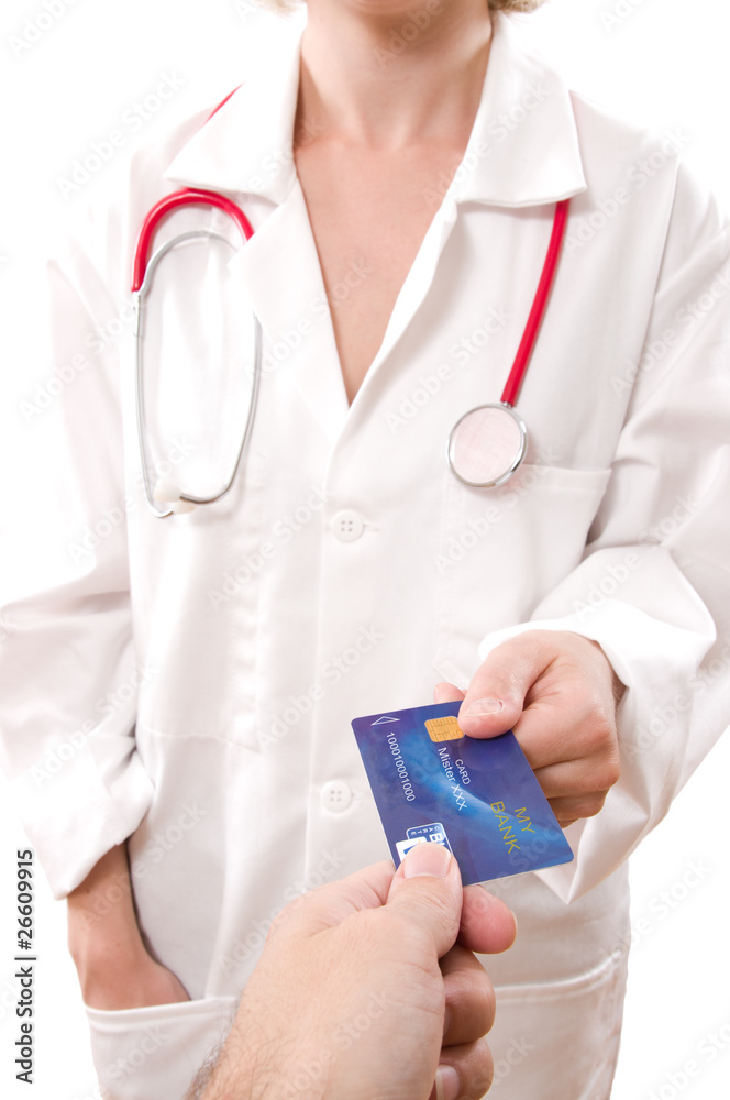 man's hand paying doctor with credit card man's hand paying doctor with credit card