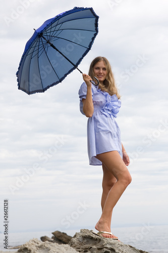 Beautiful girl with an umbrella