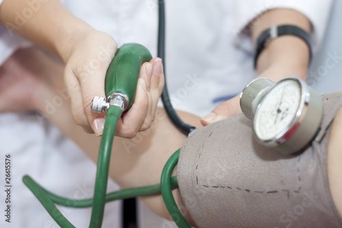 taking an arterial blood pressure