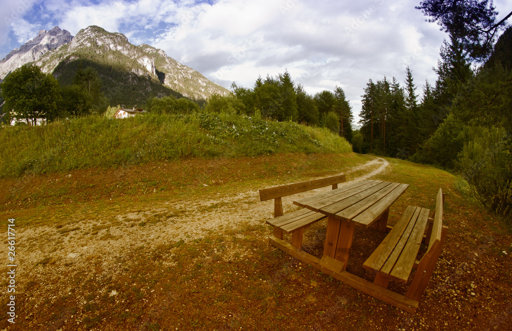 Bench on the Dolomites Mountains, Italy Bench on the Dolomites Mountains, Italy