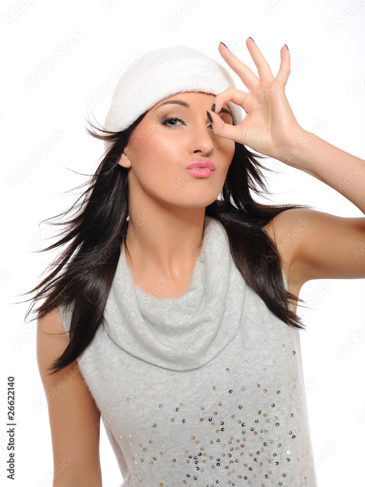 Expressions. Beautiful winter girl in a hat having fun. isolated Expressions. Beautiful winter girl in a hat having fun. isolated