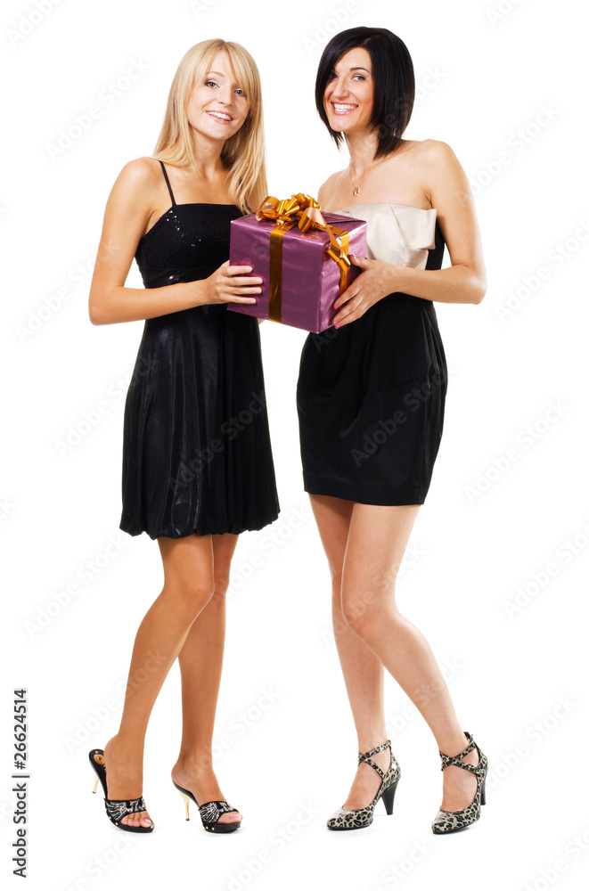 Pretty festive girls with a gift box Pretty festive girls with a gift box
