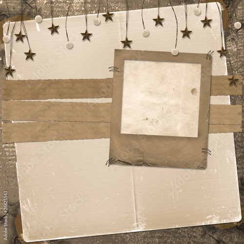 Grunge slide from grunge papers with beads and stars photo