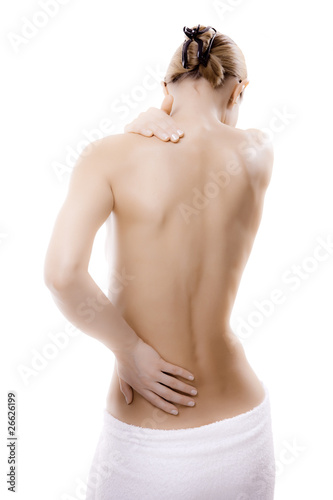Woman massaging pain back isolated on white