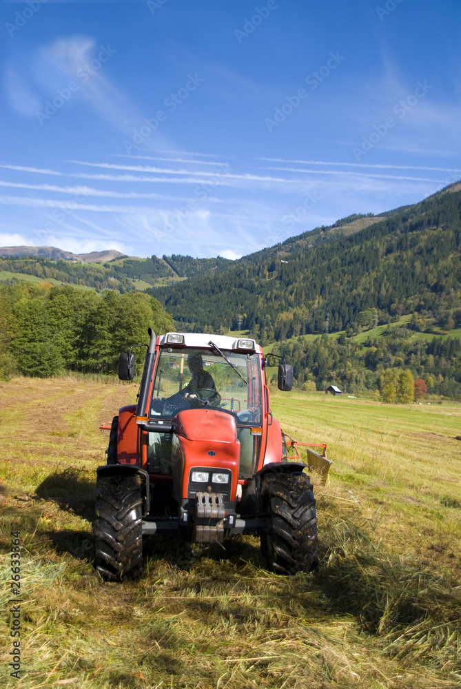 Tractor plowing field on a sunny autumn day. Tractor plowing field on a sunny autumn day.