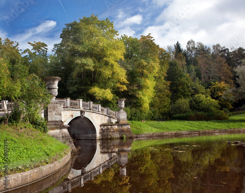The bridge and pond in the autumn in Pavlovsk park