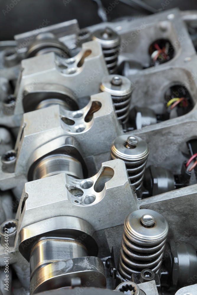 Modern engine inside, camshaft selective focus Modern engine inside, camshaft selective focus