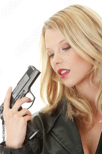Sexy blond woman with handgun