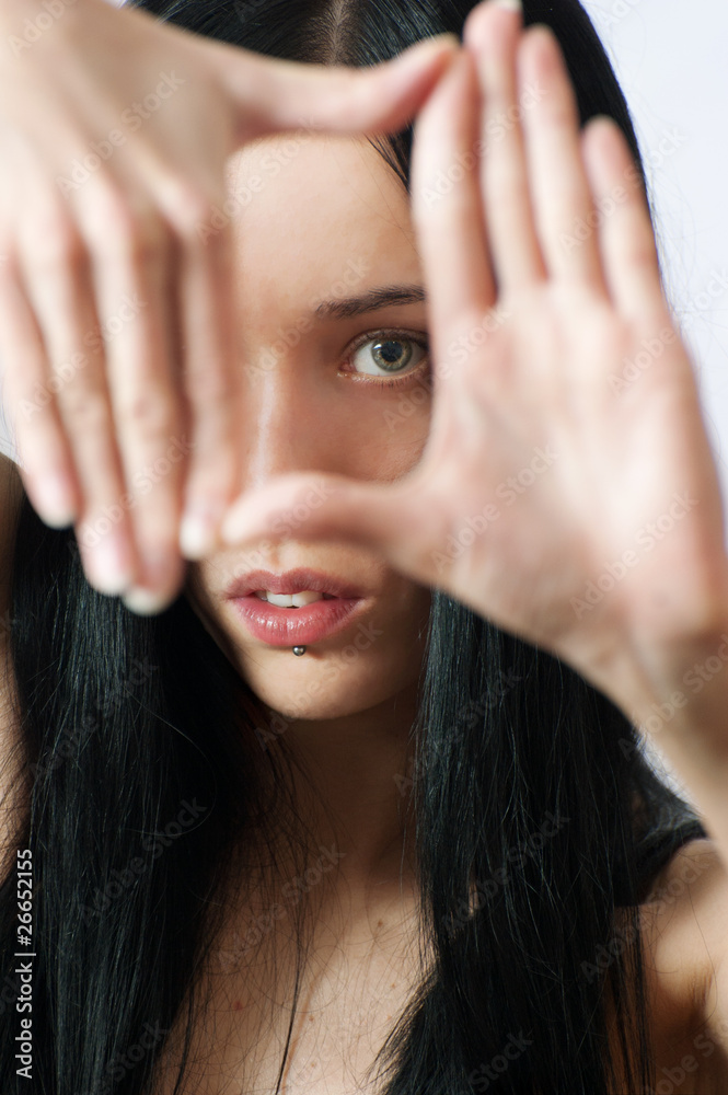 Fototapeta premium The girl photographer сrop arms (Vertical frame)