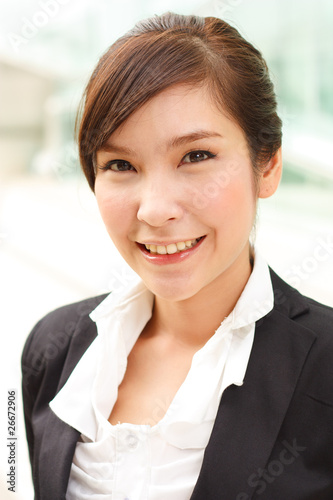 Bright closeup portrait of asian business woman