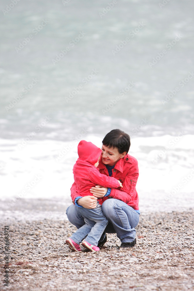 loving mother and child on beach loving mother and child on beach