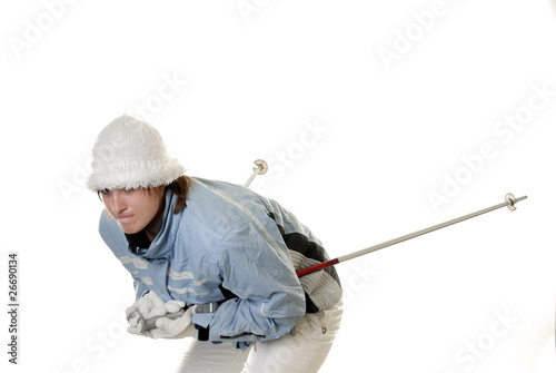 young woman skiing downhill