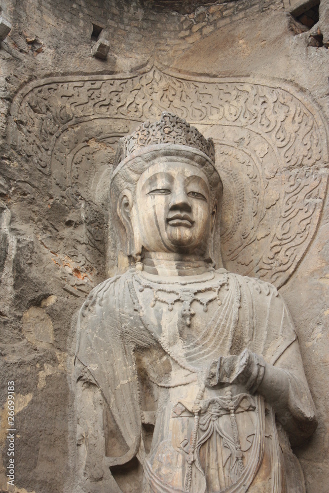 Longmen Caves in Luoyang. Statue of Bodhisattva. Longmen Caves in Luoyang. Statue of Bodhisattva.