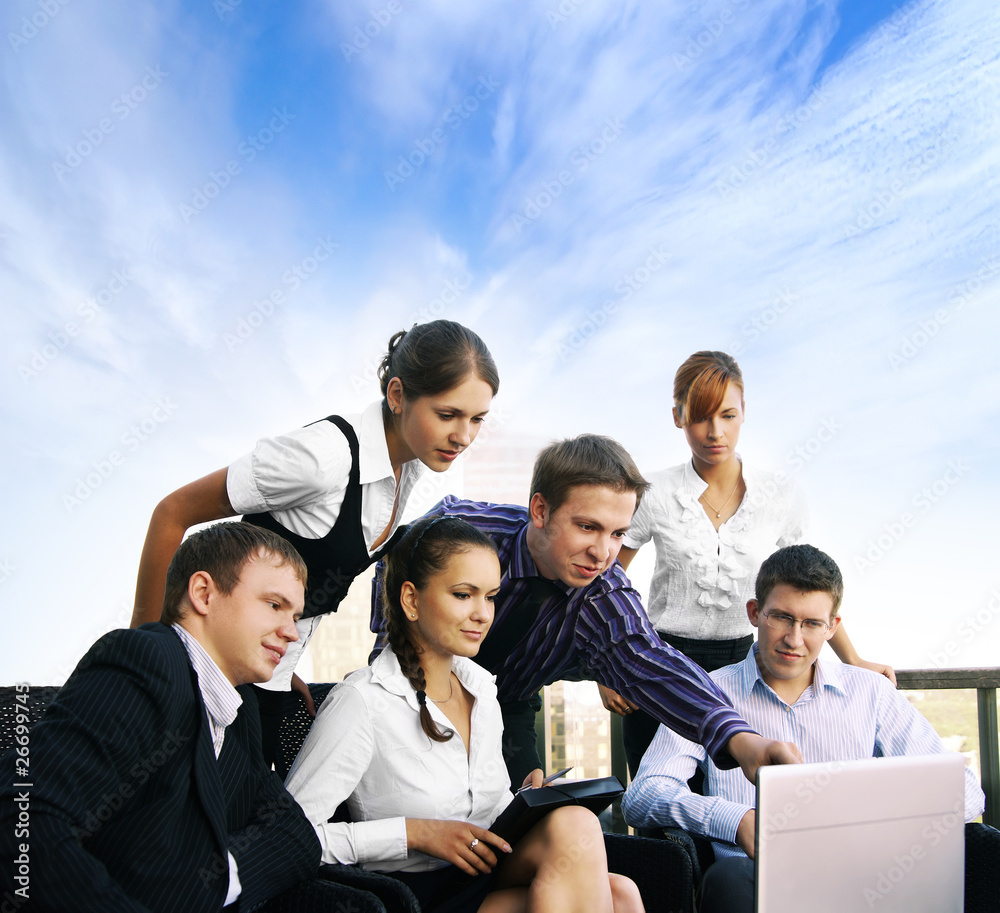 Six young and smart businesspersons are working together Six young and smart businesspersons are working together