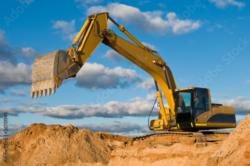 track-type loader excavator at sand quarry photo