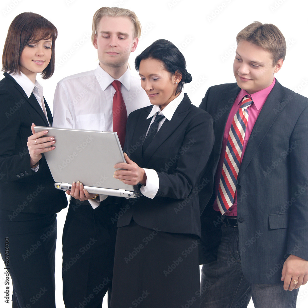 A group of four young businesspeople in formal clothes A group of four young businesspeople in formal clothes
