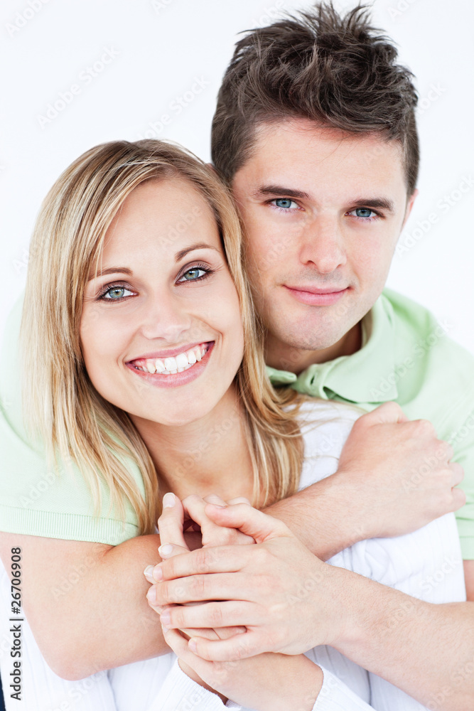Portrait of a lovely couple against white background Portrait of a lovely couple against white background